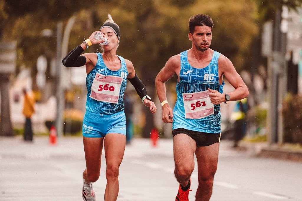 A Man and Woman Running Together